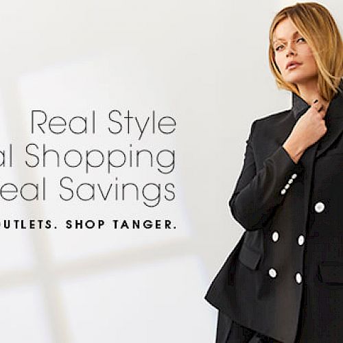 A woman in a stylish black outfit stands beside text promoting outlets and savings: "Real Style, Real Shopping, Real Savings. Shop Tanger."